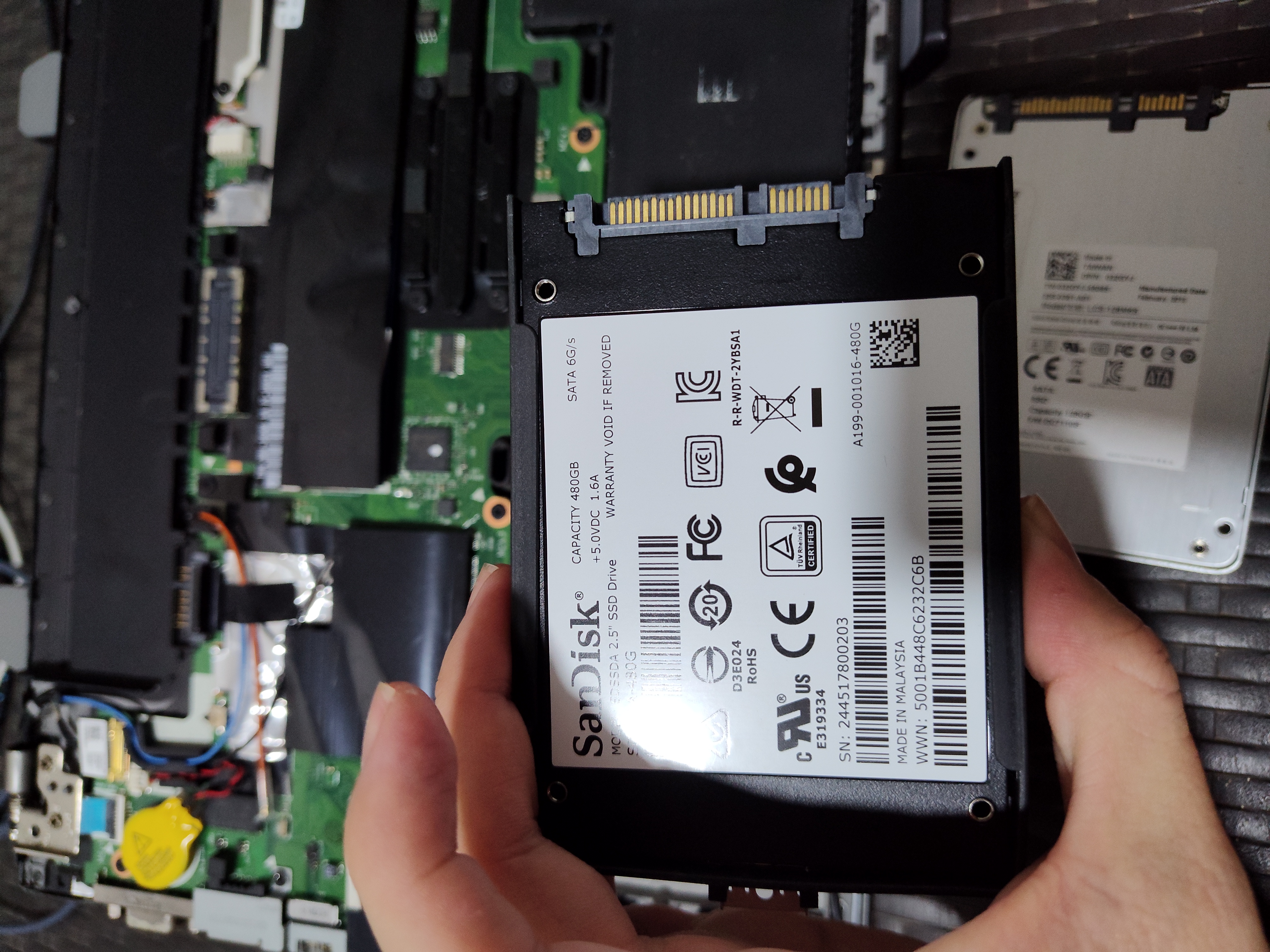 Put the new SSD on its enclosure